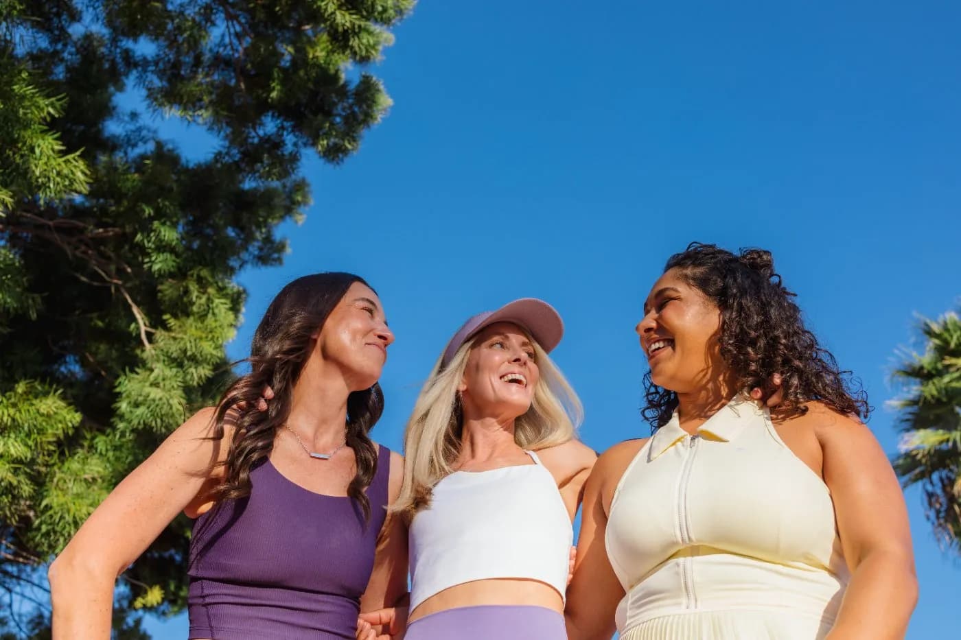 Three Brello members outdoors together